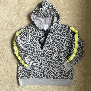 Animal print hoodie with bright yellow arm stripe